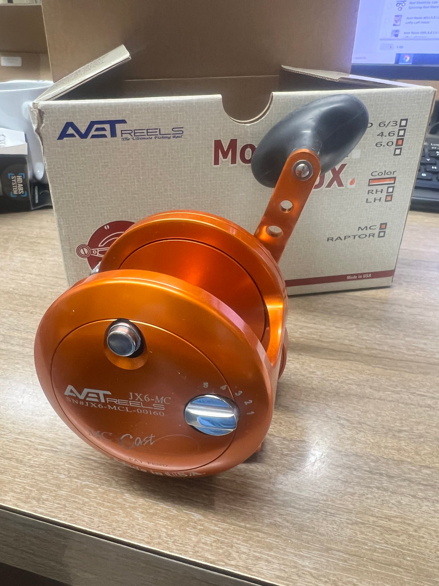 Avet Reels JX6.0 MC LH Special Orange Lefty Left Hand Master Cast Control.