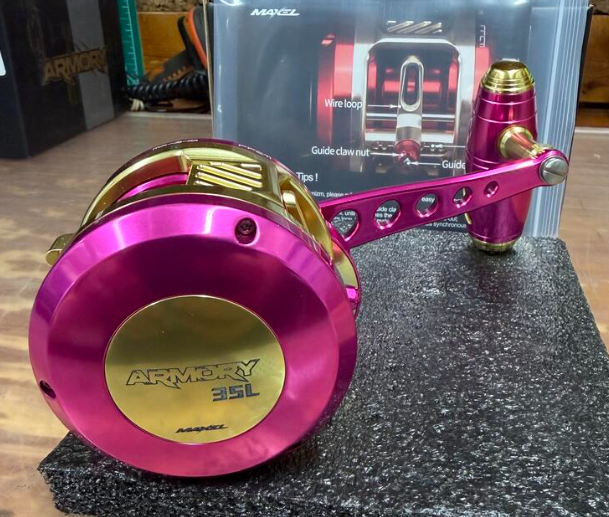 Maxel Armory 35L Level Wind Pink And Light Gold Conventional Reel Left Hand
